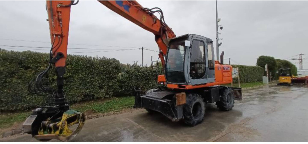 FIAT ALLIS / NEW HOLLAND EX165W - מחפר גלגלים: תמונה 2 FIAT ALLIS / NEW HOLLAND EX165W - מחפר גלגלים: תמונה 2