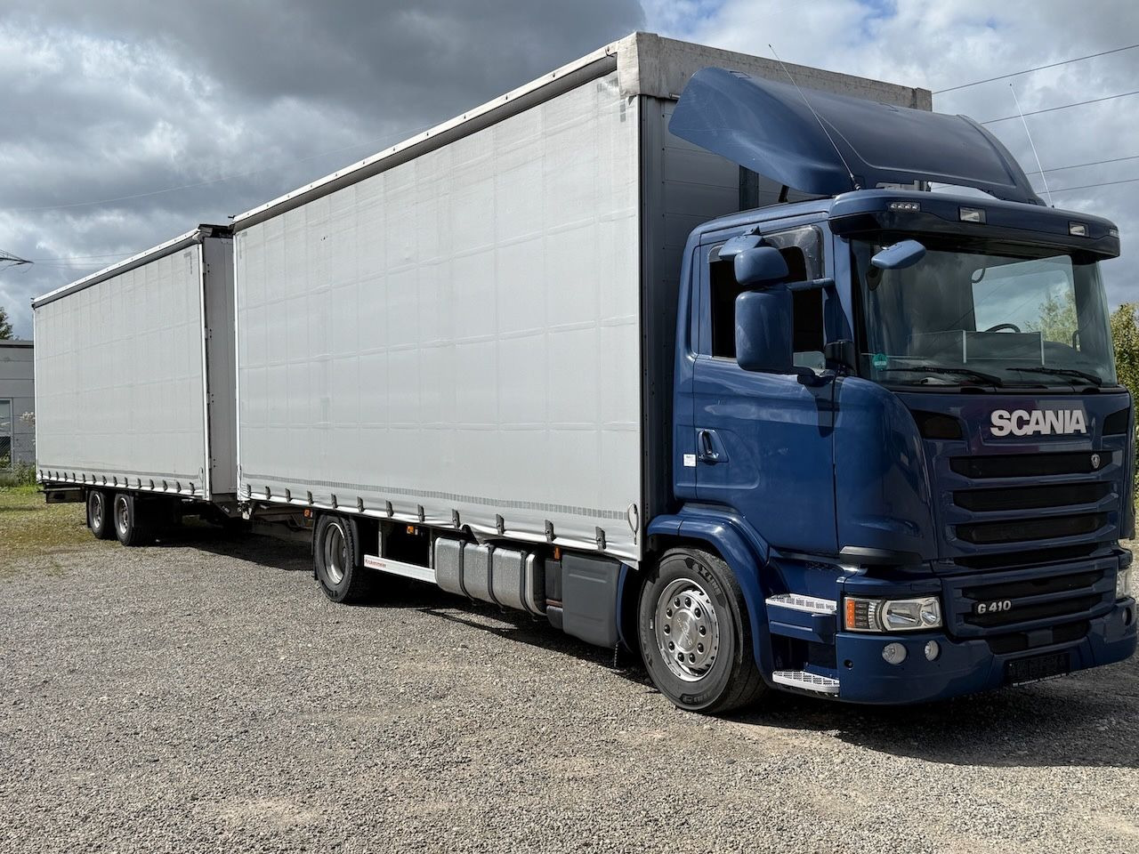 Scania G410 /4x2/ Jumbozug mit durchladbarem Anh. - משאית וילונות צד: תמונה 1 Scania G410 /4x2/ Jumbozug mit durchladbarem Anh. - משאית וילונות צד: תמונה 1