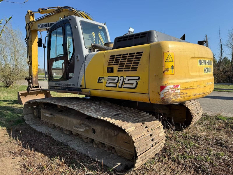New Holland E215 - מחפר סורק: תמונה 2 New Holland E215 - מחפר סורק: תמונה 2