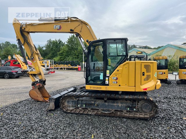 Cat 310 - מיני מחפר: תמונה 1 Cat 310 - מיני מחפר: תמונה 1