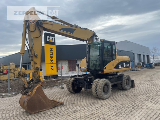 Cat M316C - מחפר גלגלים: תמונה 1 Cat M316C - מחפר גלגלים: תמונה 1
