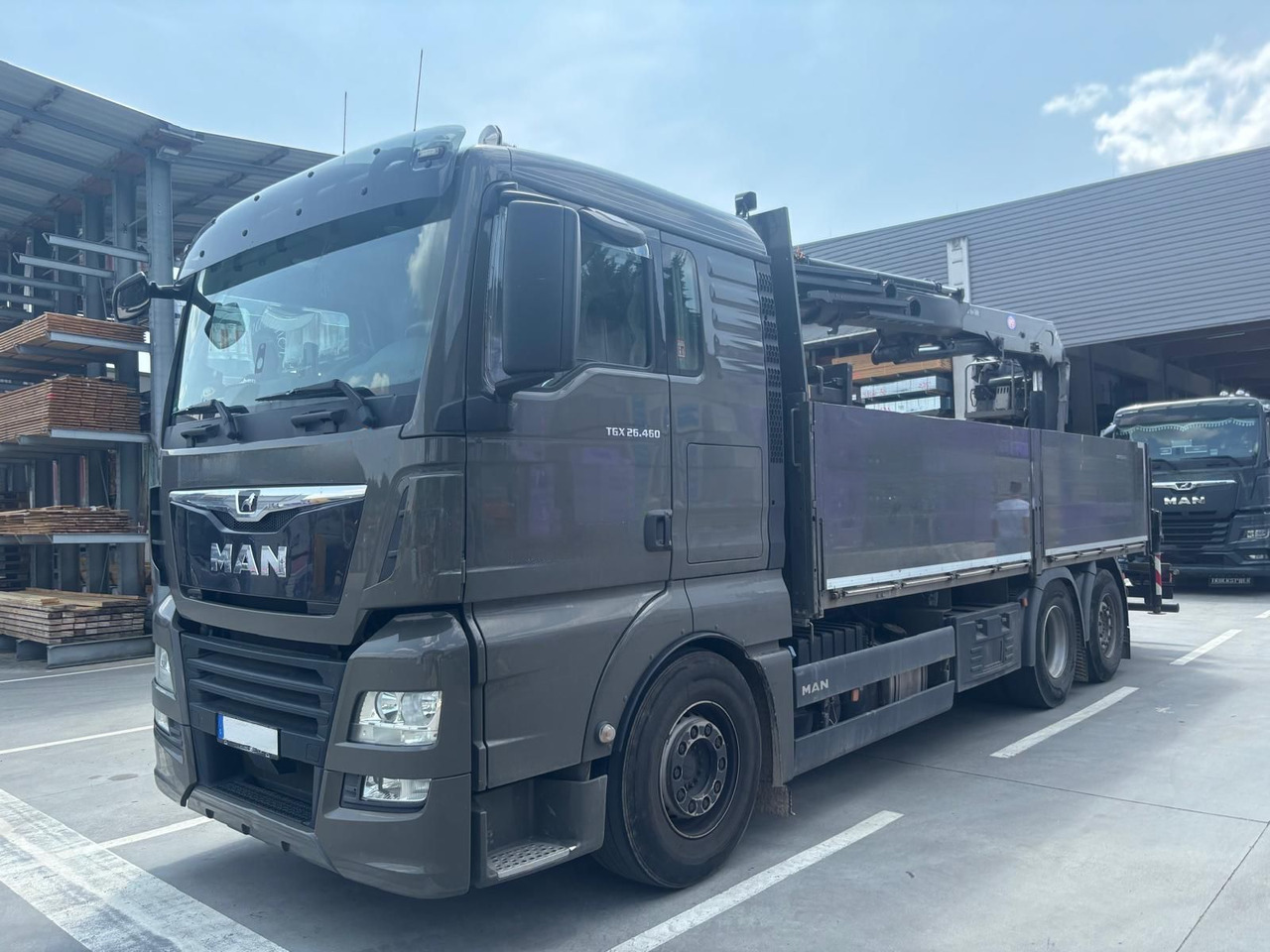 MAN 26.460 TGX Baustoffkran HMF 2110-L3 - משאית מנוף: תמונה 1 MAN 26.460 TGX Baustoffkran HMF 2110-L3 - משאית מנוף: תמונה 1